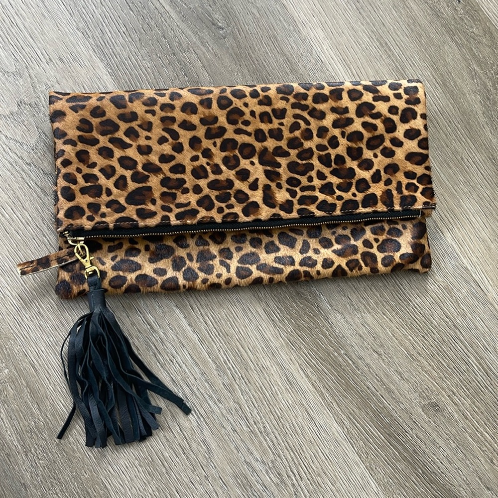 Animal print clutch in pony hair